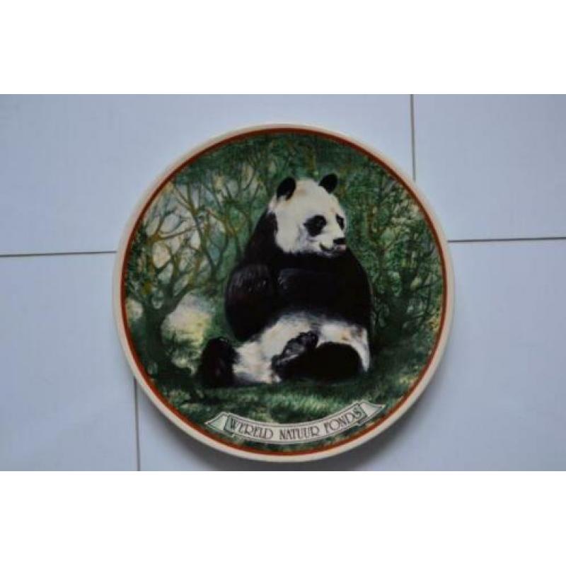 Oud wandbord wereld natuur fonds.