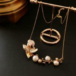 trouwsieraden goudkleurige ketting met parels