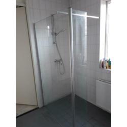 Glazen douche wand