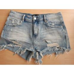 Korte bruine broek suede achtig maat m