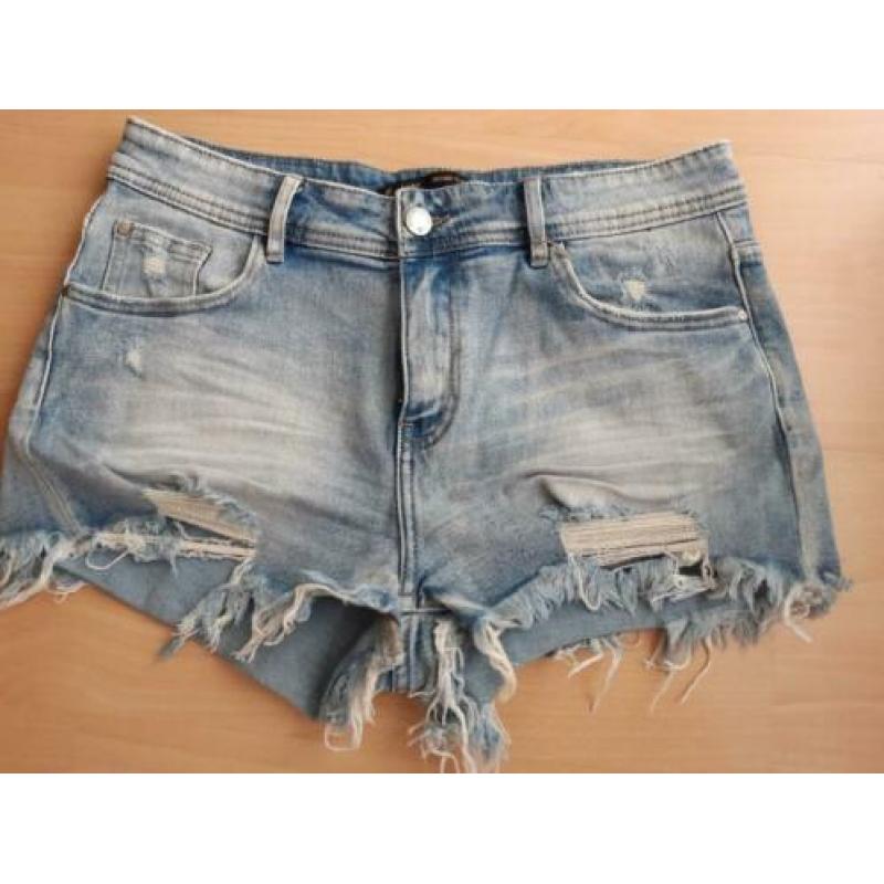 Korte bruine broek suede achtig maat m