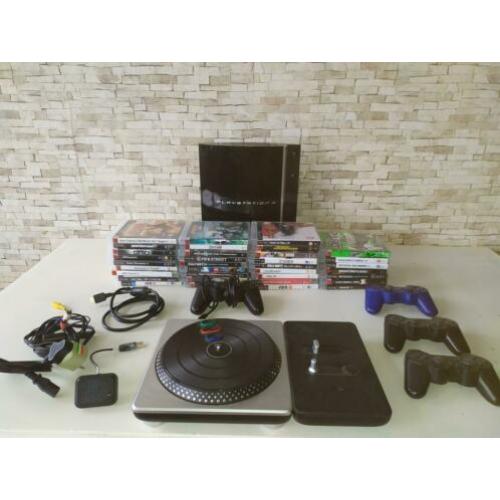 Ps3 inclusief games en accessoires.
