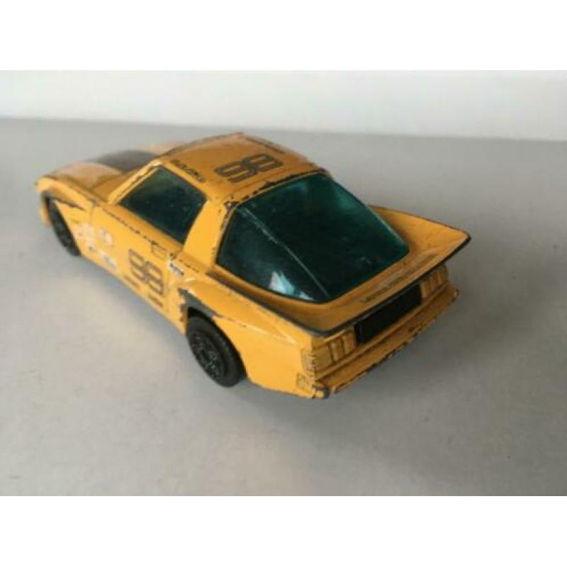 Bburago Mazda RX-7, geel met decals, 1/43
