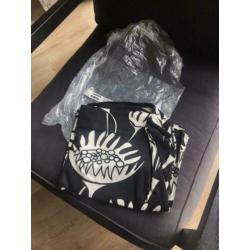 Gratis Ikea schommelstoel Lillberg met nieuwe set bekleding
