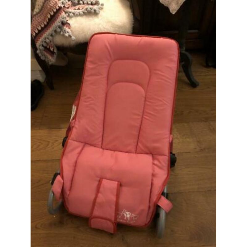 roze schommel stoel