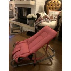 roze schommel stoel