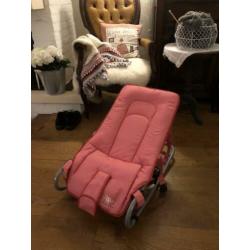 roze schommel stoel