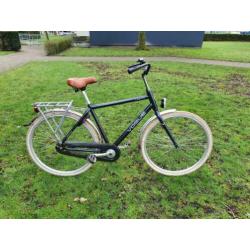 Een mooie vogue herenfiets