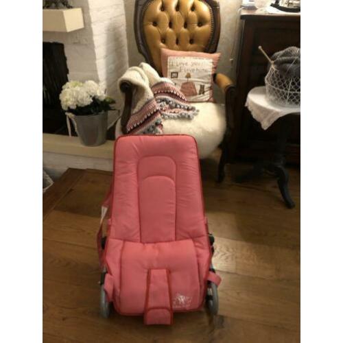 roze schommel stoel