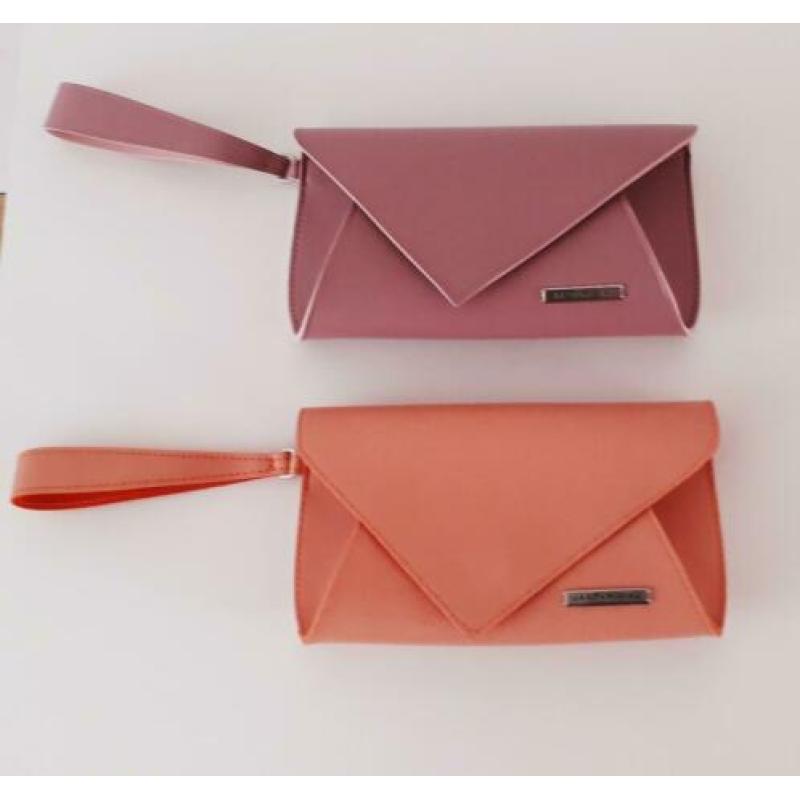 Jan Taminiau voor KLM tas toilettas bag clutch roze violet