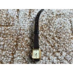 Lorus dames horloge quartz.bandje is versleten aan de binne