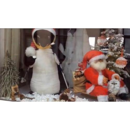 Bewegende kerstman op slee - etalage - decoratie - kerst