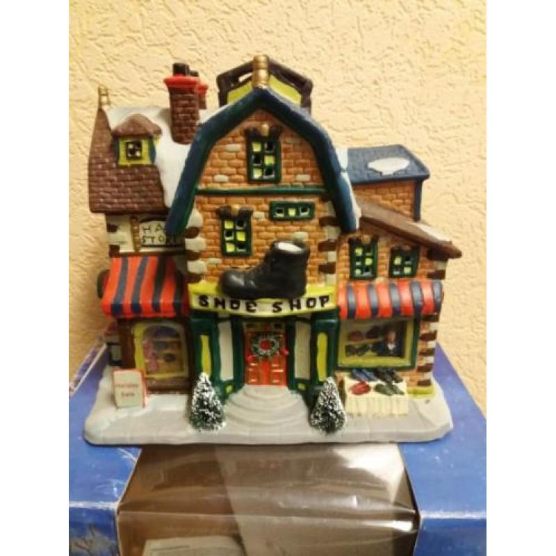 Kersthuisjes van dickensville alle 4 voor €40 En trein.