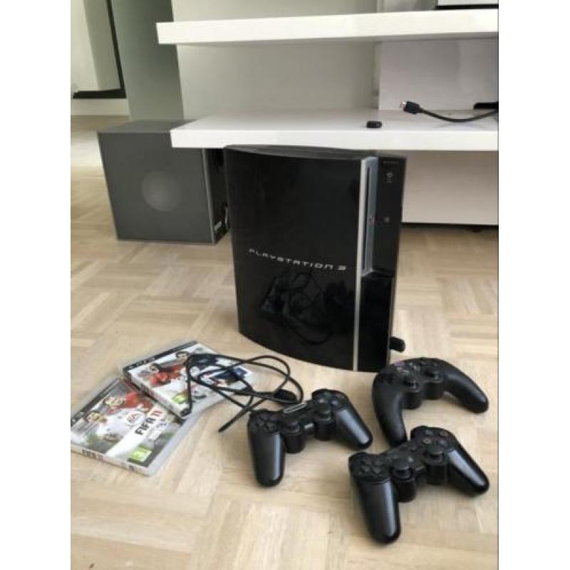 PlayStation 3 met 3 controllers en 2 spellen