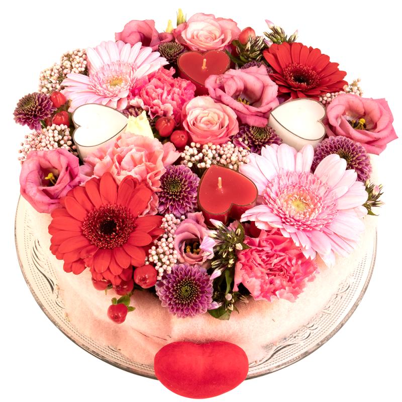 Bloementaart roze rood met hartje waxinelichtjes